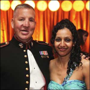 Man in military uniform with his wife