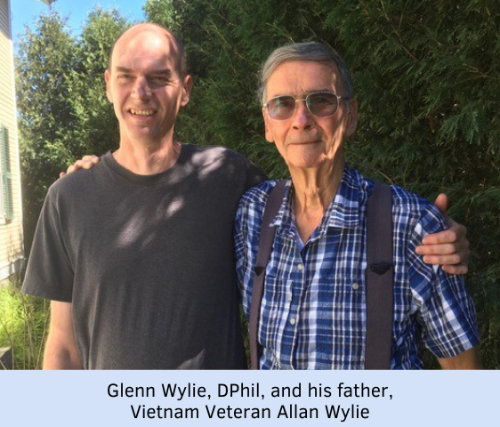 Researcher Glenn Wylie, DPhil, standing with his father, Vietnam Veteran Allan Wylie.