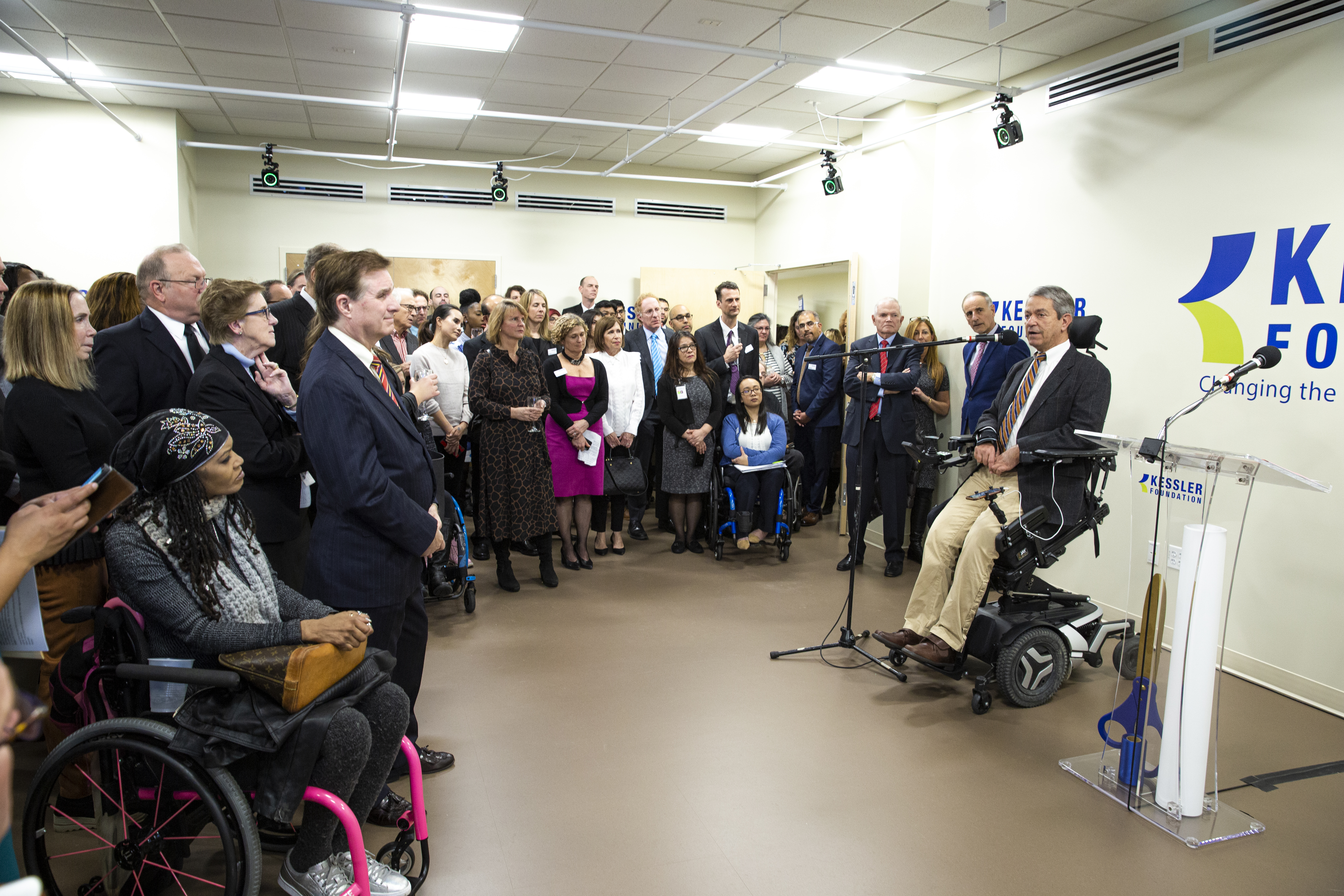 Peter Hersh speaking in front of a group at the Reynolds Center grand opening