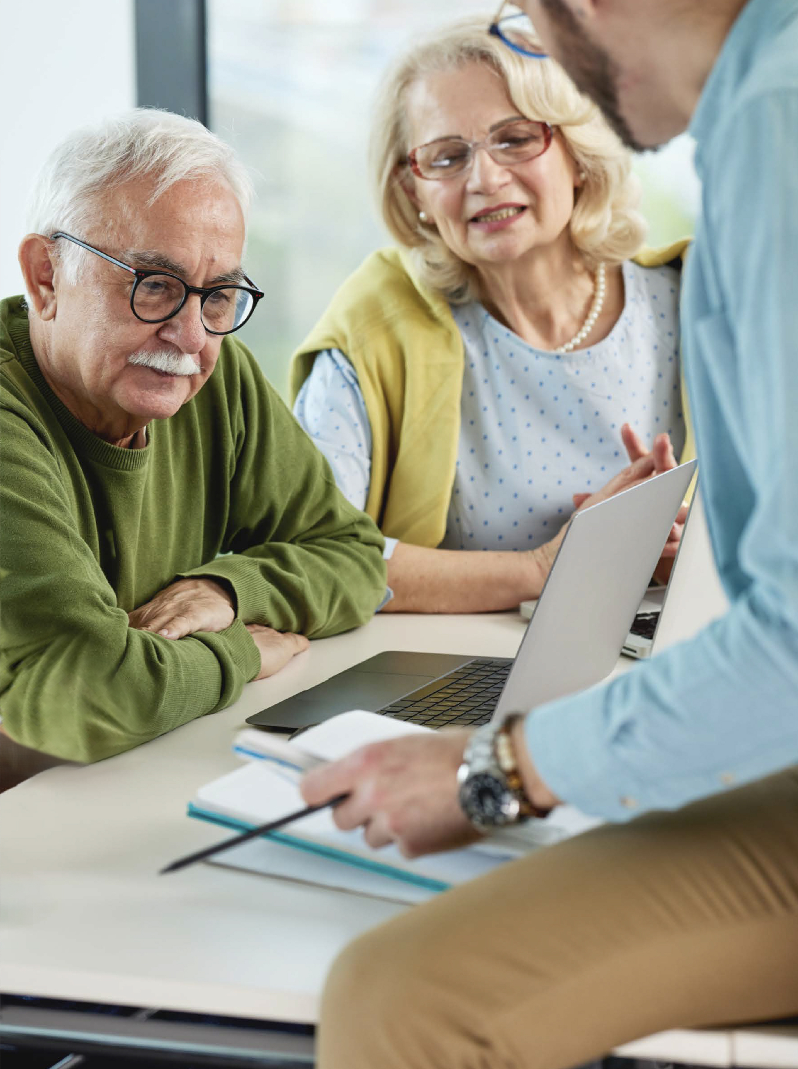 Healthy aging adults looking at keyboard