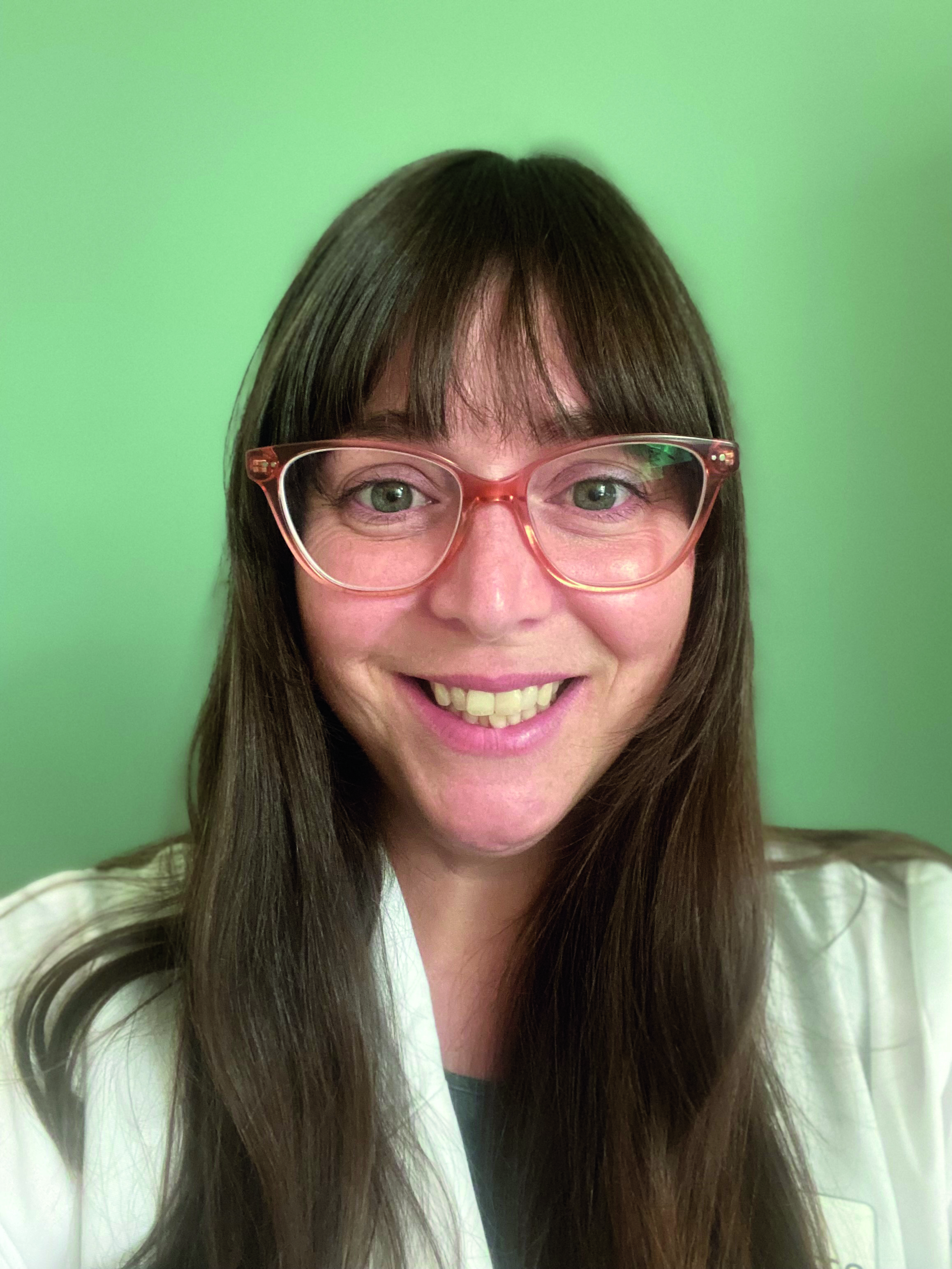 Image of Dr. Jennifer Russo. She has long brown hair and glasses.