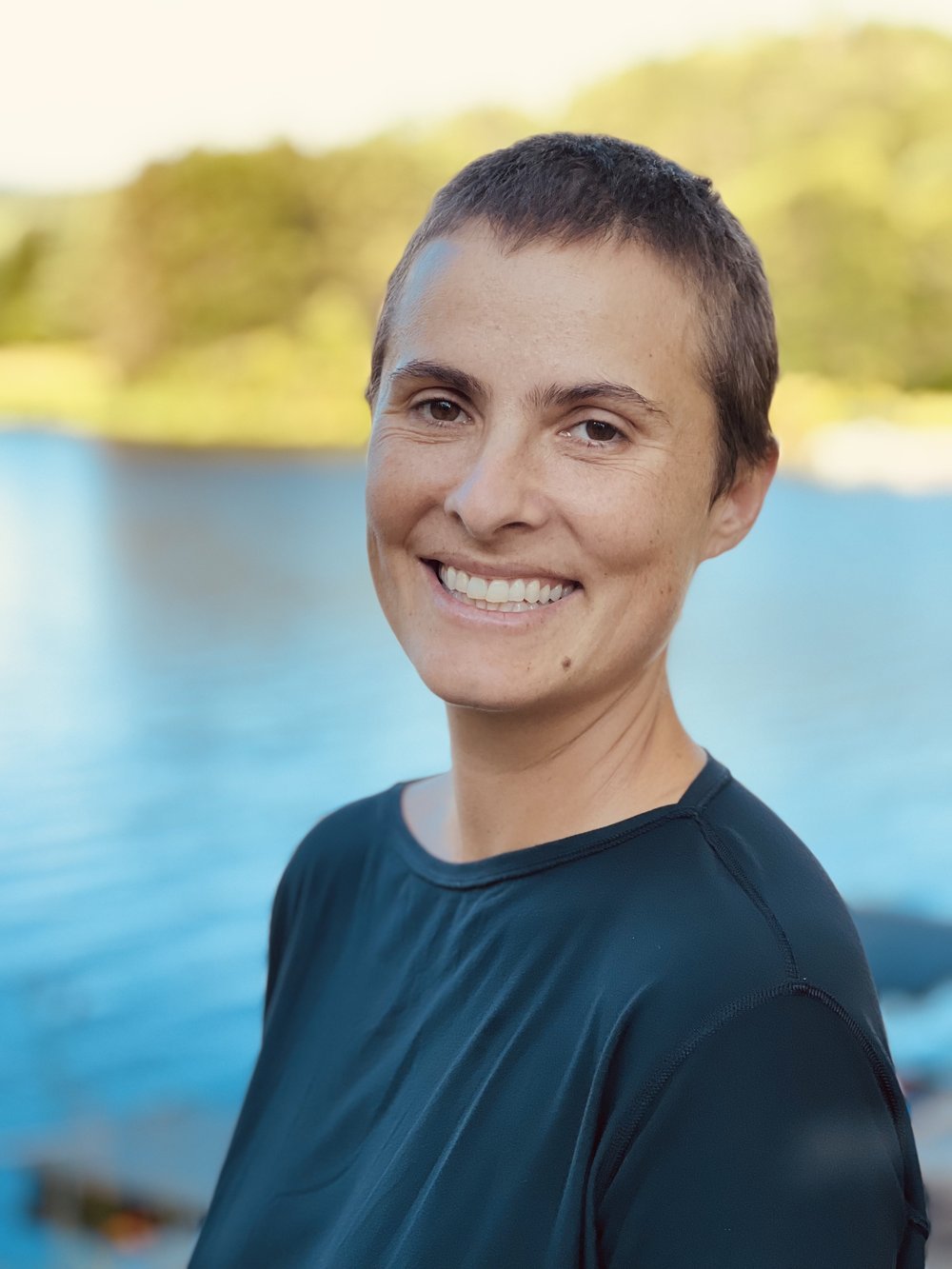 Woman with short hair at a park