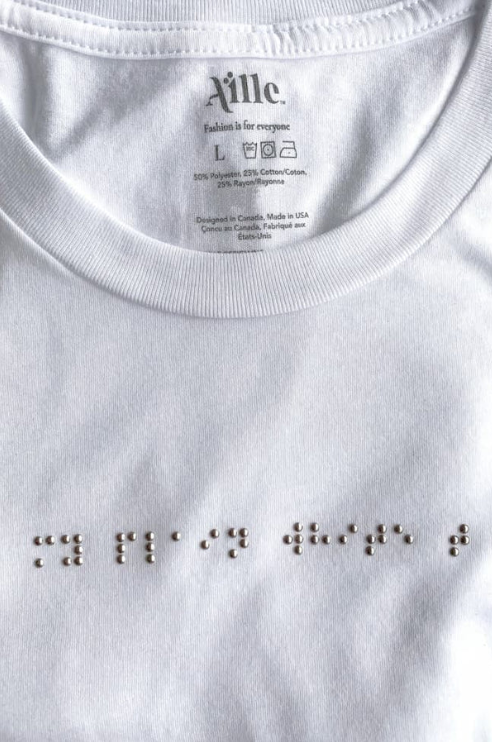 White shirt with braille on the front