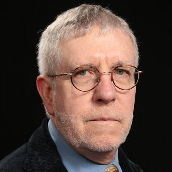 Man with eyeglasses and black jacket