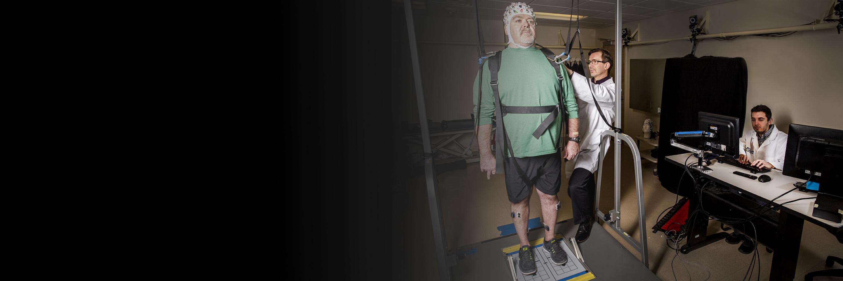 participant in research study about balance with an eeg cap on
