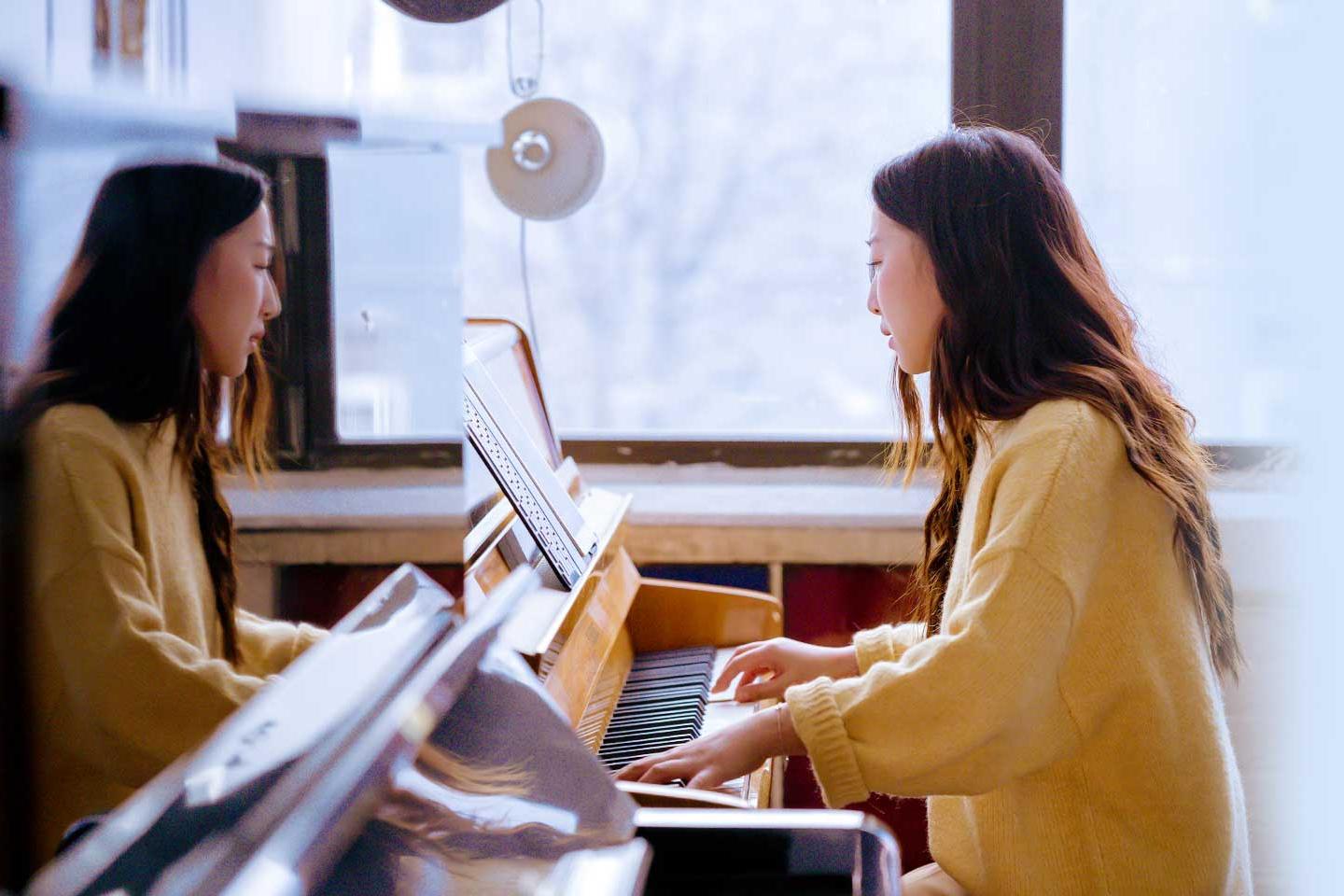 lady playing a piano