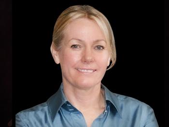 Headshot Gail Forrest,PhD with a Black Background