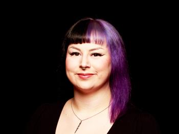 Headshot of Haleigh Hamrick with black background