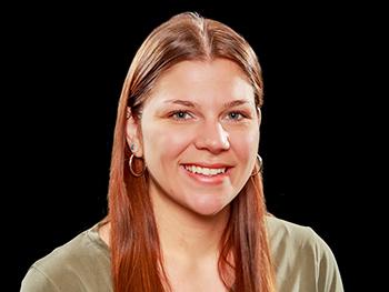 Haley Nauman headshot with black background