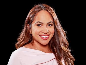 Sarah Yulianti headshot with black background