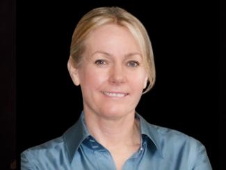 Headshot Gail Forrest,PhD with a Black Background