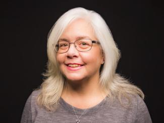 Nancy Moore on black background