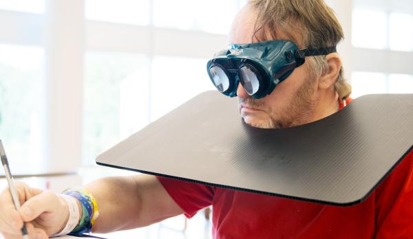 participant using the spatial neglect goggles 