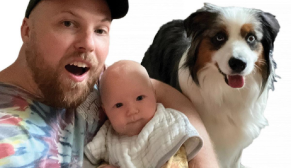 William Hall with child and dog