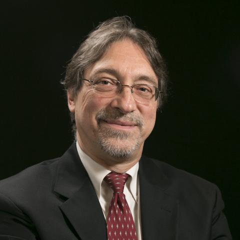 Head-shot of John DeLuca