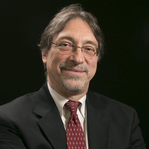 Head-shot of Dr. John DeLuca