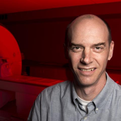 Glenn Wylie in Imaging Room with Red Light