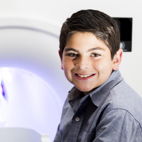 Mock Scanner with boy sitting in front of it