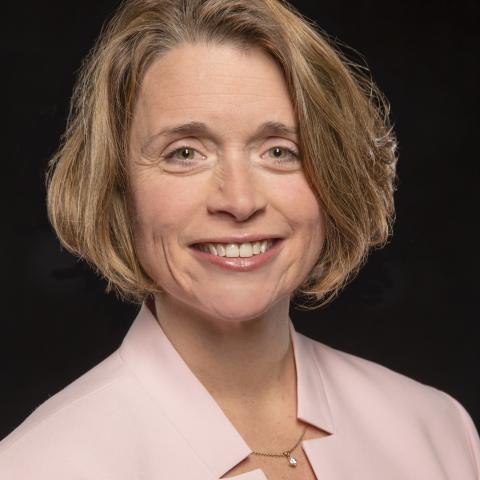 Head-shot of Dr. Nancy Chiaravalloti against a black background