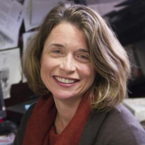 dr chiaravalloti wearing a red sweater with a gray jacket
