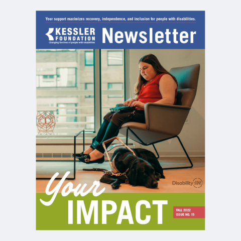 newsletter cover with woman on chair with her service dog