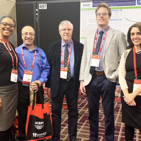 Photo of five Kessler researchers at ACRM conference