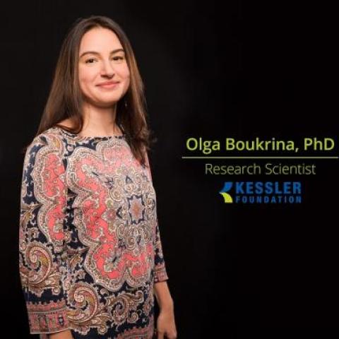 Olga Boukrina, PhD with a Black Background next to a Kessler Foundation Logo