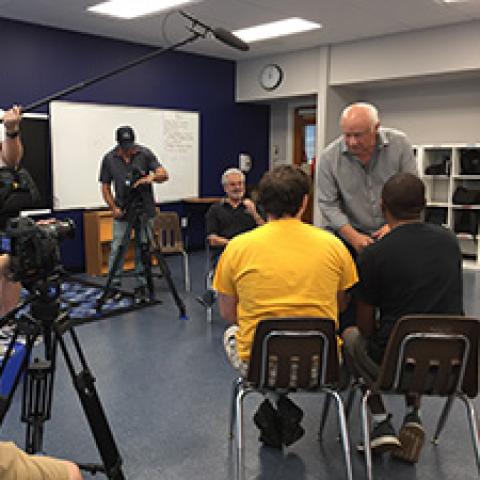 Joey Travolta instructing students