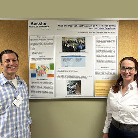 man and woman giving a presentation on kessler foundation's research