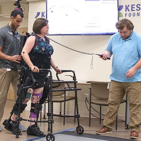 women on walker at Kessler Foundation
