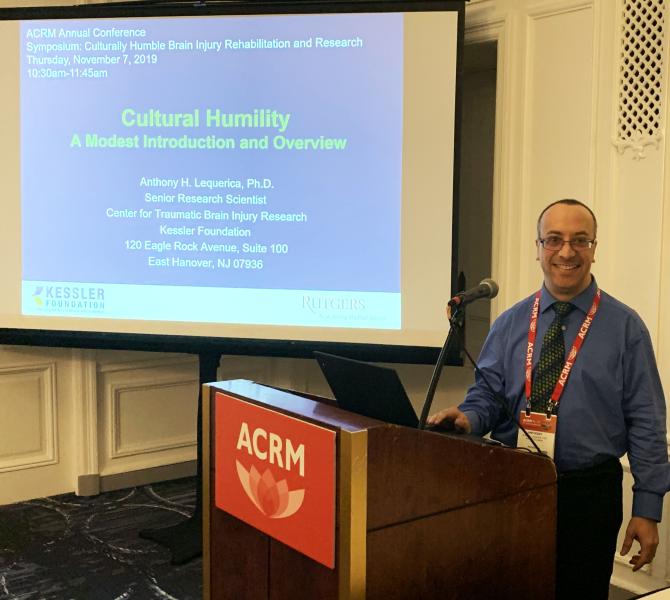 Photo of Dr. Anthony Lequerica presenting at the ACRM conference 