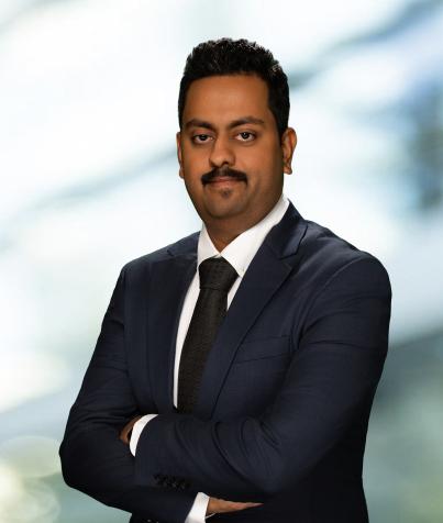 headshot of Virkram Shenoy Handiru