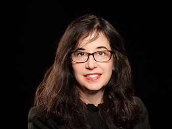 Head shot of Lauri Wactlar with black background