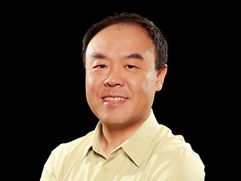 Headshot of Brian Yao on a black background