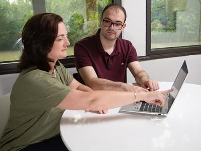 Particp and and Helen Genova, PhD reviewing KF-Stride® online app